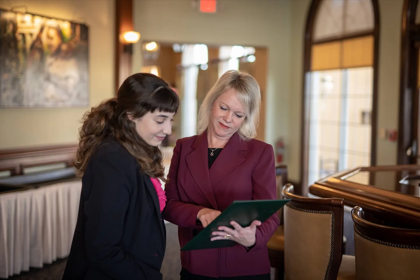Gecko Hospitality recruiter reviewing a placement with a candidate